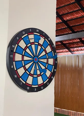 Dart board setup at Riveria by V Stays for indoor games and fun