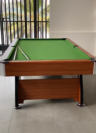 Billiards table at Riveria by V Stays for relaxing indoor entertainment