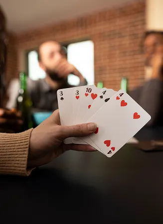 Playing cards arranged for leisure time at Riveria by V Stays